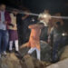 लिफ्ट लेकर और बोल्डर पार कर आपदा प्रभावित गांव पहुंचे धन सिंह रावत।